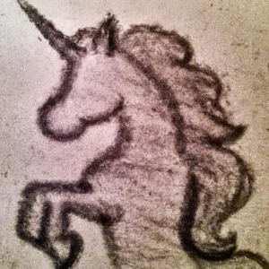 Jednorog u talogu od kafe u šolji